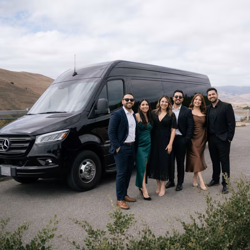 Group beside a Mercedes Sprinter limo from the Salinas fleet