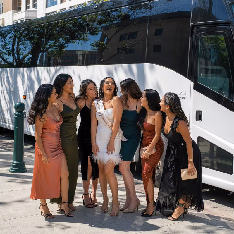 Passengers loading luggage while boarding an Salinas group shuttle