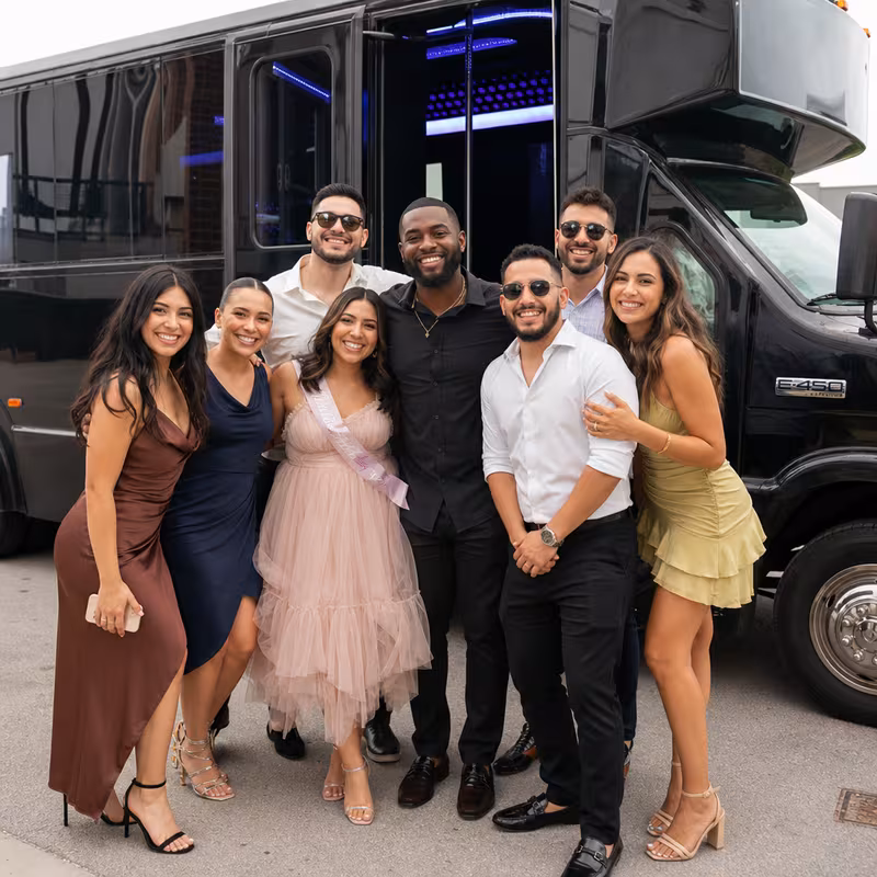 Party bus interior with wraparound leather seating and LED lighting in Salinas