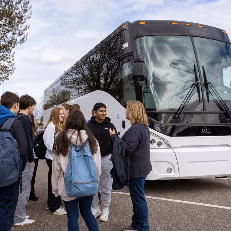 Black Mercedes Sprinter van staged for an Salinas School Transportation group