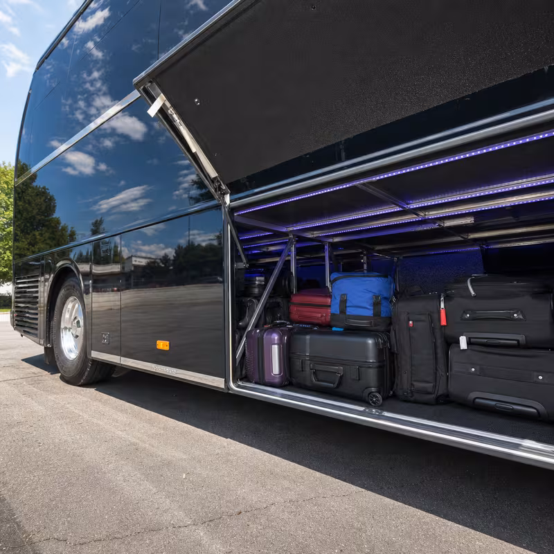 Party bus interior with wraparound leather seating and LED lighting in Salinas