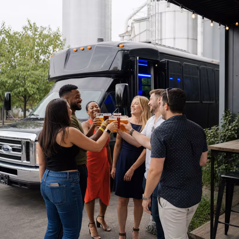 Passengers loading luggage while boarding an Salinas group shuttle